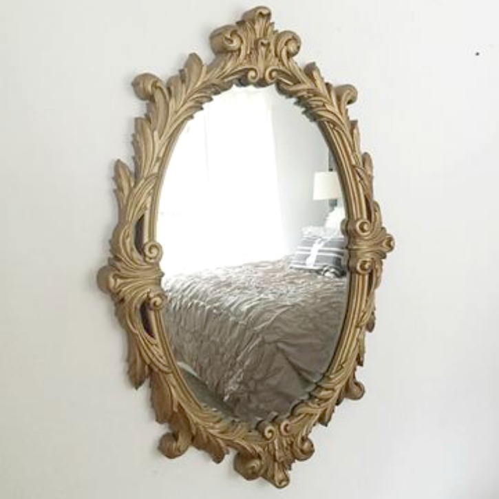 fancy oval mirror