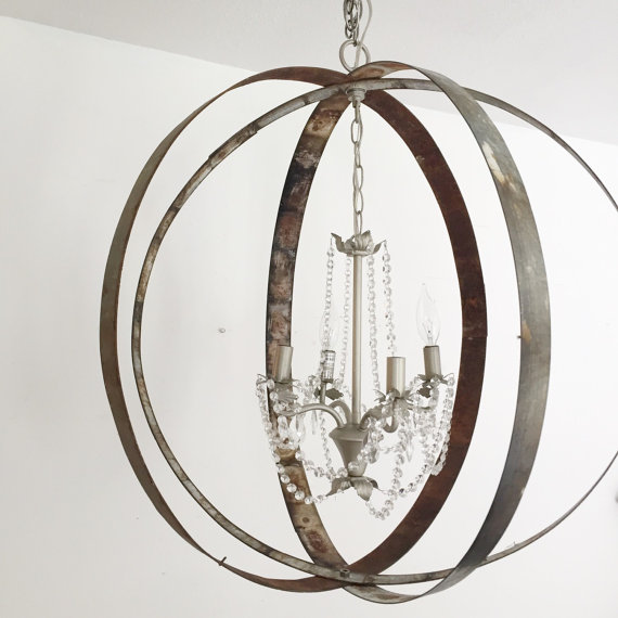 metal orb hanging ceiling light with crystal chandelier in the middle