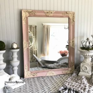 Sweet and Easy Valentines Party Decor with Heart Banner pink and white ornate mirror