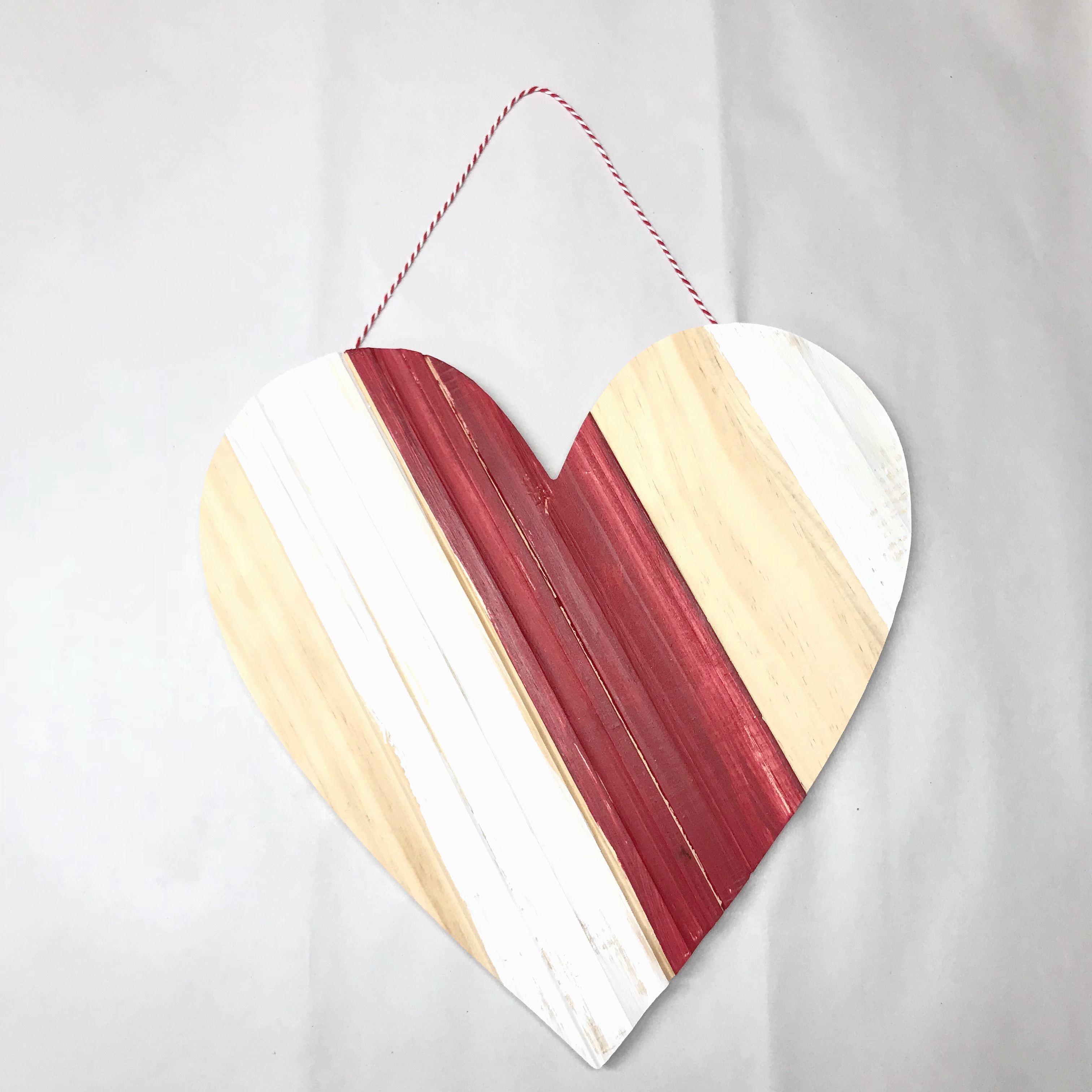 Striped heart shaped wall hanging