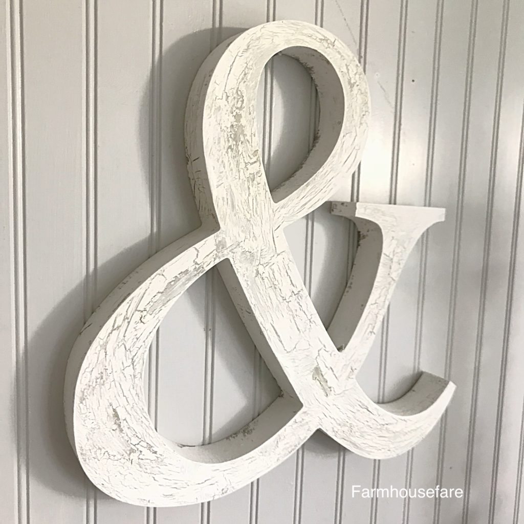 white chippy painted wood ampersand wall hanging