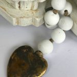 white wood beads strand with metal heart