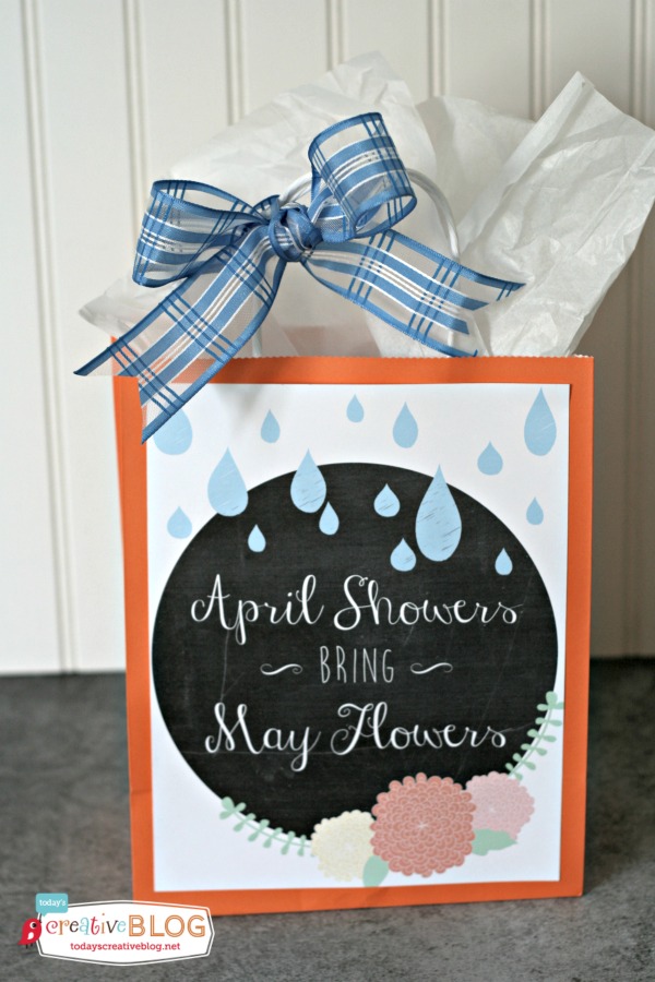 april showers bring may flowers printable with rain and flowers pasted on a gift bag