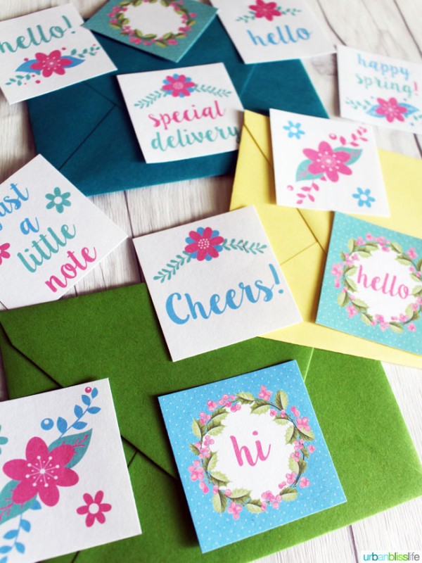 colorful envelopes with little stickers scattered around