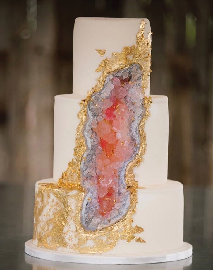 pink geode cake with gold