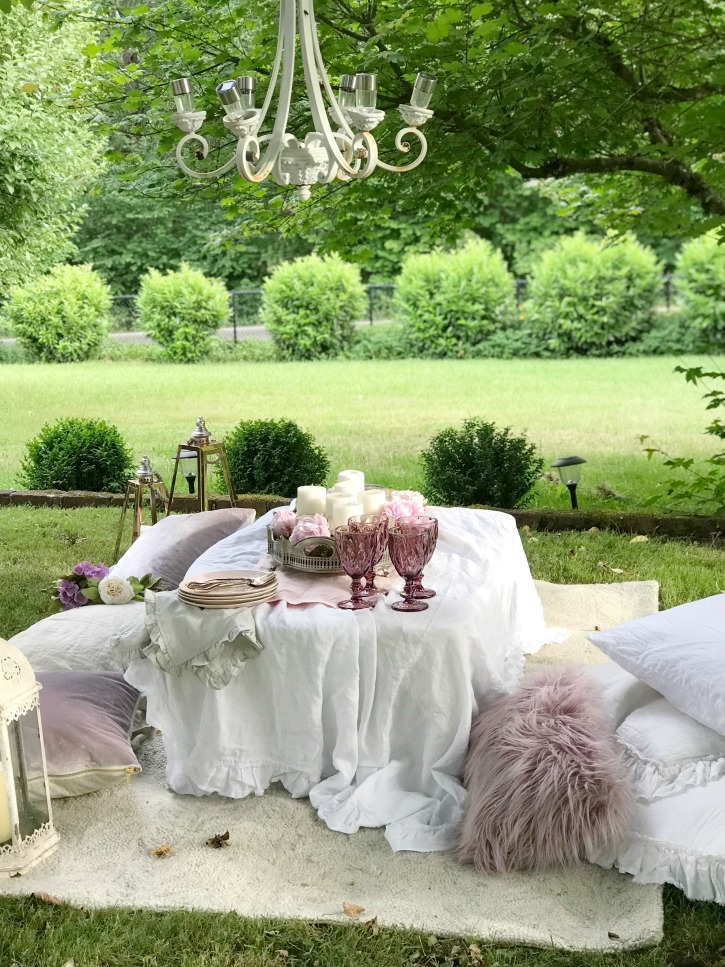 white table with purple pillows