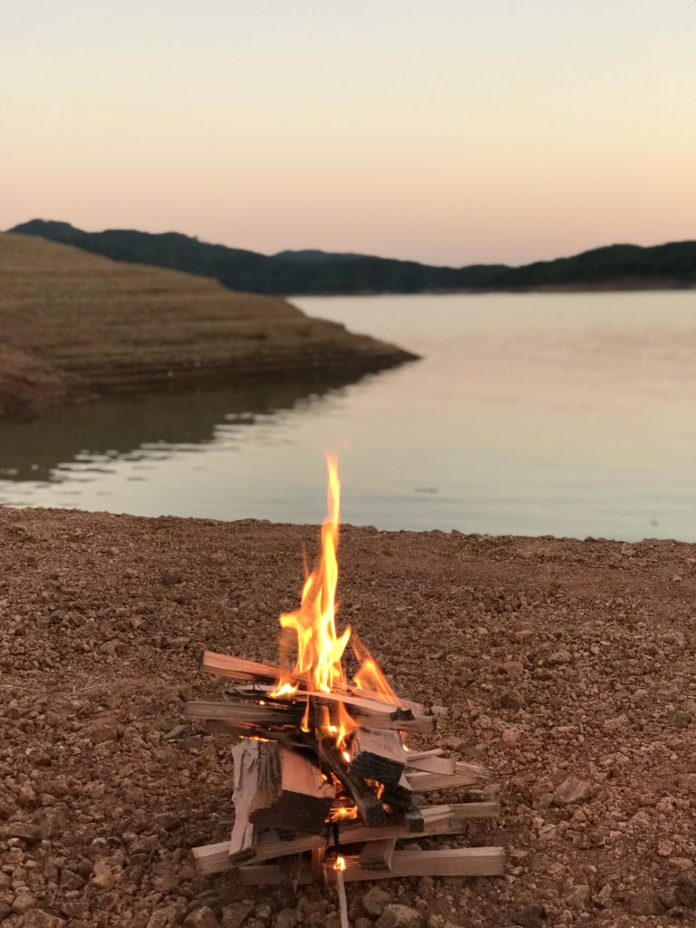 fire on the shore of lake