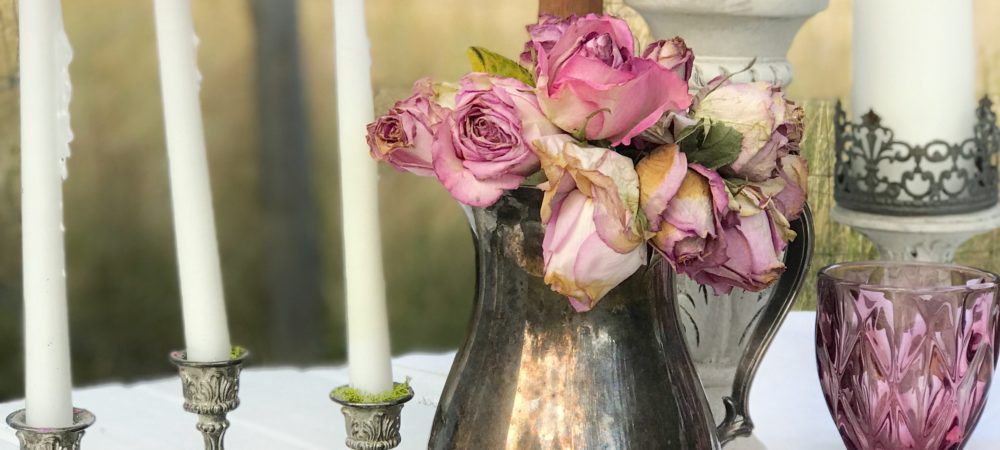 purple glasses with platter of ie cream sandwiches and vase of flowers