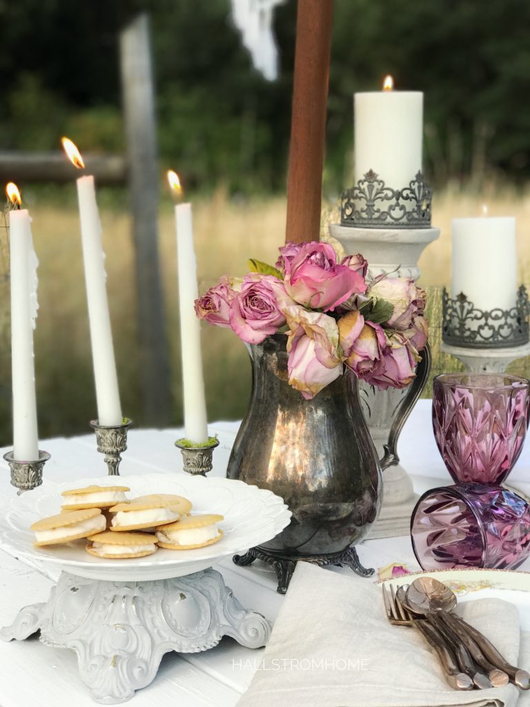 purple glasses with platter of ie cream sandwiches and vase of flowers