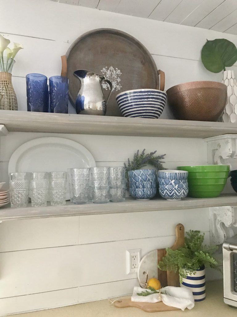 How to Organize Your Kitchen for Open Shelving with cups plates bowls