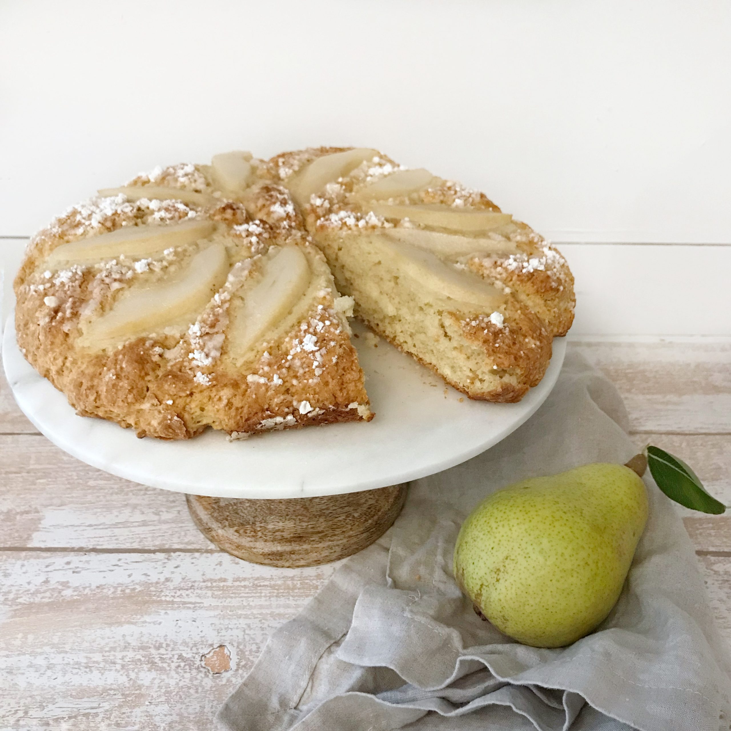 Beautiful Fall Farmhouse Home Tour with Easy Scone Recipe with pear scones on platter and pear sitting next to it