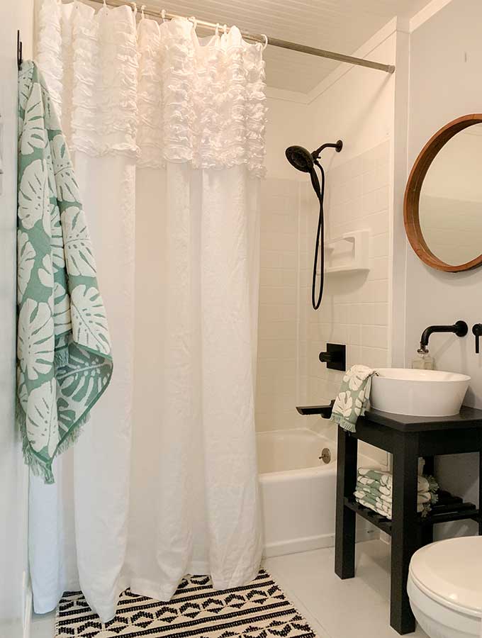 Small Bathroom Makeover Ideas|guest bathroom|powder room|paint color|bathroom makeovers|small bathroom makeover|small bathroom|storage space|bathroom remodels|before and after|pedestal sink|earth elements|bathroom faucet|delta faucets|sponsored|sink faucet|floor tiles|Hallstrom Home