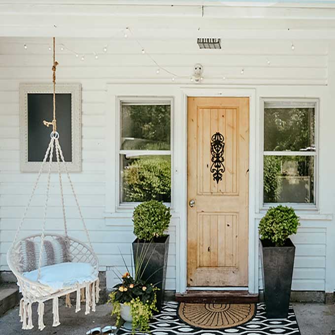 Hygge Porch Design with Swing |hygge life|hygge products|adding hygge|hygge chairs|hygge decor|simple porch designs|Scandinavian Porch|porch design ideas|boho porch|boho home|bohemian decor|Hallstrom Home 