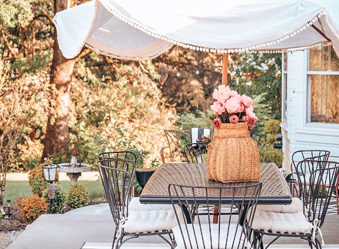 DIY Umbrella Cover with Pom Poms|diy umbrella|diy patio umbrella|outdoor umbrella|how to make umbrella from scratch|how to make patio umbrella|how to replace umbrella fabric|shabby chic|boho decor|patio decor|shabby chic patio|farmhouse patio|bohemian patio|easy diy|easy diy umbrella|summer crafts|summer diy|Yard diy|garden diy|garden craft|easy craft|Hallstrom Home