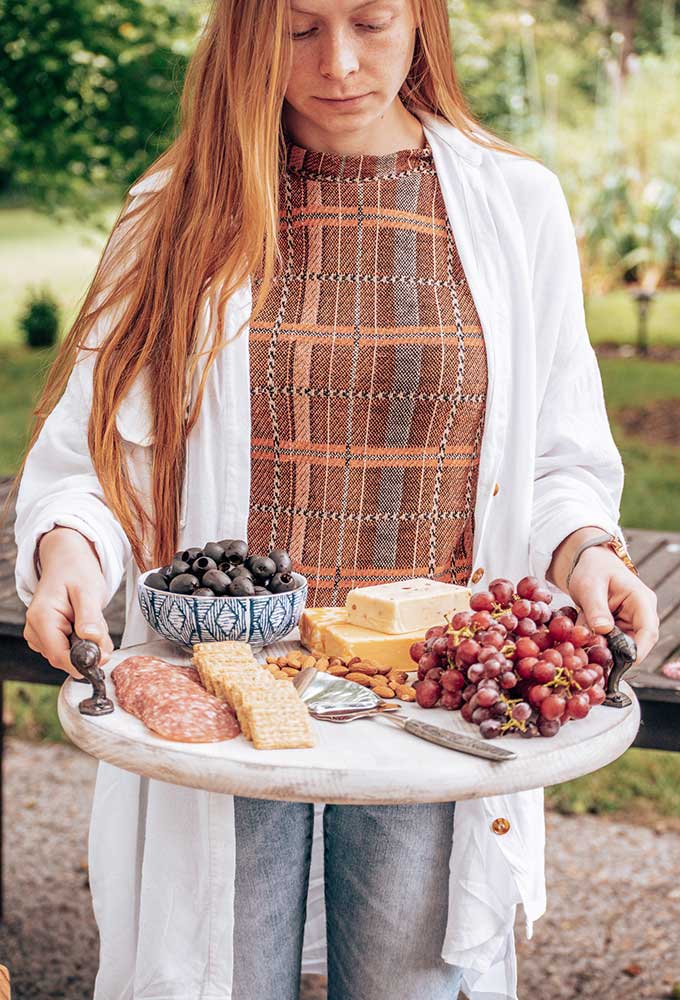 How to Use a Charcuterie Board for Entertaining|outdoor entertaining|how to assemble cheese board|cheese platter presentation|cheese platter appetizer|Farmhouse dining|outdoor dining|veranda|party planning|appetizer recipes|best recipes|party recipes|entertaining recipes|hallstrom home