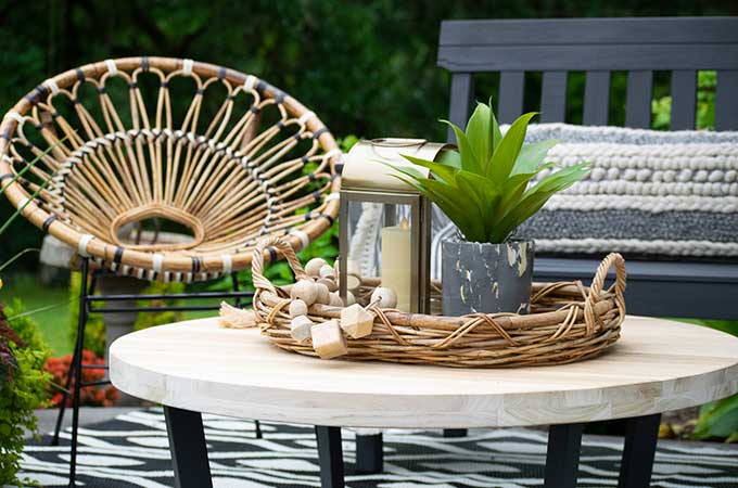 Sophisticated Bohemian Outdoor Setting|Article|Boho Patio|rattan furniture|decorate bohemian|patio update|outdoor entertaining| myarticle|boho home decor|sophisticated boho|scandinavian home|boho outdoor furniture|bohemian furniture|boho chic patio ideas|boho outdoor spaces|bohemian outdoor rug|Hallstrom Home