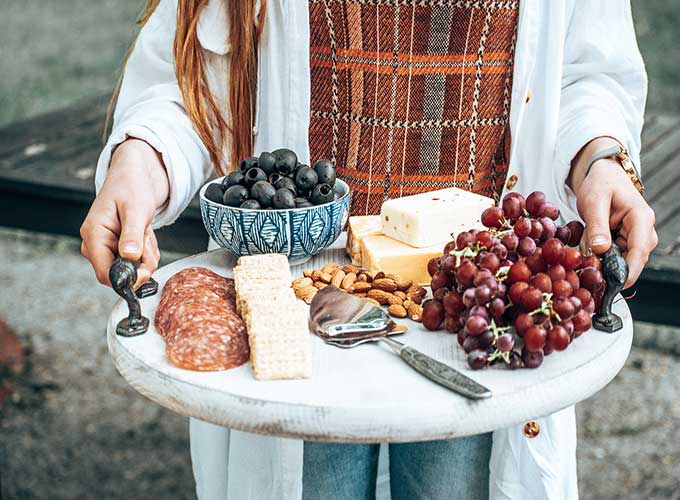 How to Use a Charcuterie Board for Entertaining|outdoor entertaining|how to assemble cheese board|cheese platter presentation|cheese platter appetizer|Farmhouse dining|outdoor dining|veranda|party planning|appetizer recipes|best recipes|party recipes|entertaining recipes|hallstrom home