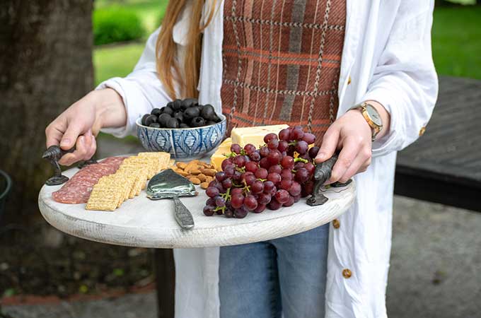 How to Use a Charcuterie Board for Entertaining|outdoor entertaining|how to assemble cheese board|cheese platter presentation|cheese platter appetizer|Farmhouse dining|outdoor dining|veranda|party planning|appetizer recipes|best recipes|party recipes|entertaining recipes|hallstrom home