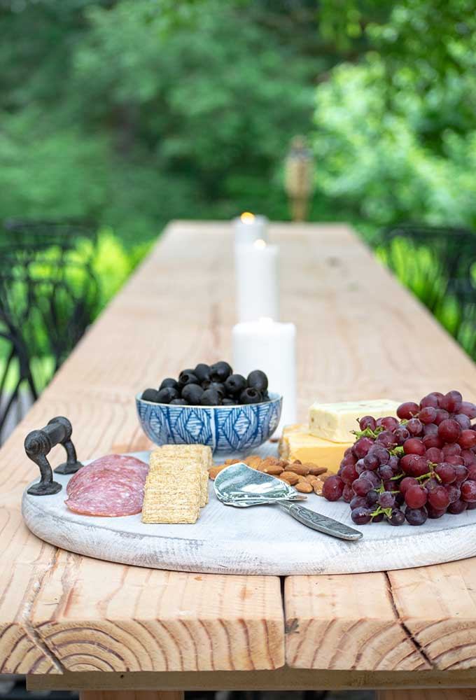 How to Use a Charcuterie Board for Entertaining|outdoor entertaining|how to assemble cheese board|cheese platter presentation|cheese platter appetizer|Farmhouse dining|outdoor dining|veranda|party planning|appetizer recipes|best recipes|party recipes|entertaining recipes|hallstrom home