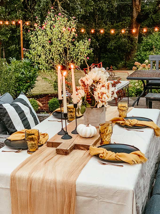 Easy Fall Outdoor Table with Drop Cloth |drop cloth tablecloth|diy tablecloth|fall outdoor table|farmhouse table|outdoor entertaining|farmhouse style|wedding table|wedding table setting|gauze table runner|cheesecloth table runner|simple fall decor|easy fall table|fall centerpiece|simple farmhouse table|pumpkin table setting|fall pumpkin table|cozy table setting|cozy fall|hygge home|Hallstrom Home