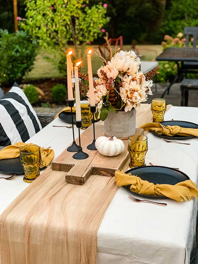 Easy Fall Outdoor Table with Drop Cloth |drop cloth tablecloth|diy tablecloth|fall outdoor table|farmhouse table|outdoor entertaining|farmhouse style|wedding table|wedding table setting|gauze table runner|cheesecloth table runner|simple fall decor|easy fall table|fall centerpiece|simple farmhouse table|pumpkin table setting|fall pumpkin table|cozy table setting|cozy fall|hygge home|Hallstrom Home