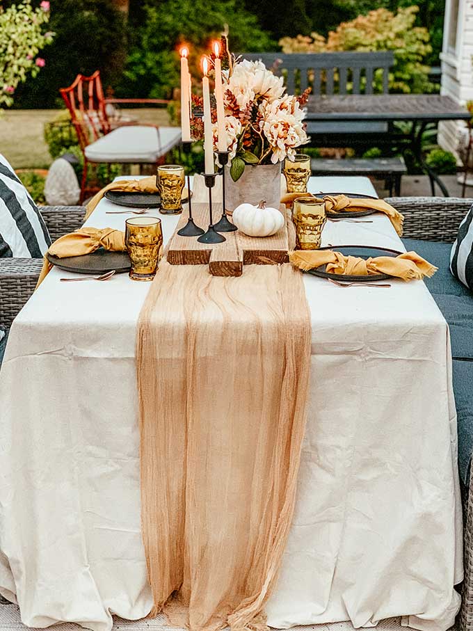 Easy Fall Outdoor Table with Drop Cloth |drop cloth tablecloth|diy tablecloth|fall outdoor table|farmhouse table|outdoor entertaining|farmhouse style|wedding table|wedding table setting|gauze table runner|cheesecloth table runner|simple fall decor|easy fall table|fall centerpiece|simple farmhouse table|pumpkin table setting|fall pumpkin table|cozy table setting|cozy fall|hygge home|Hallstrom Home