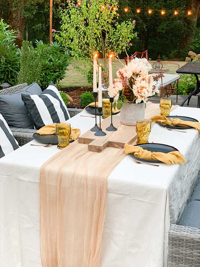 Easy Fall Outdoor Table with Drop Cloth |drop cloth tablecloth|diy tablecloth|fall outdoor table|farmhouse table|outdoor entertaining|farmhouse style|wedding table|wedding table setting|gauze table runner|cheesecloth table runner|simple fall decor|easy fall table|fall centerpiece|simple farmhouse table|pumpkin table setting|fall pumpkin table|cozy table setting|cozy fall|hygge home|Hallstrom Home