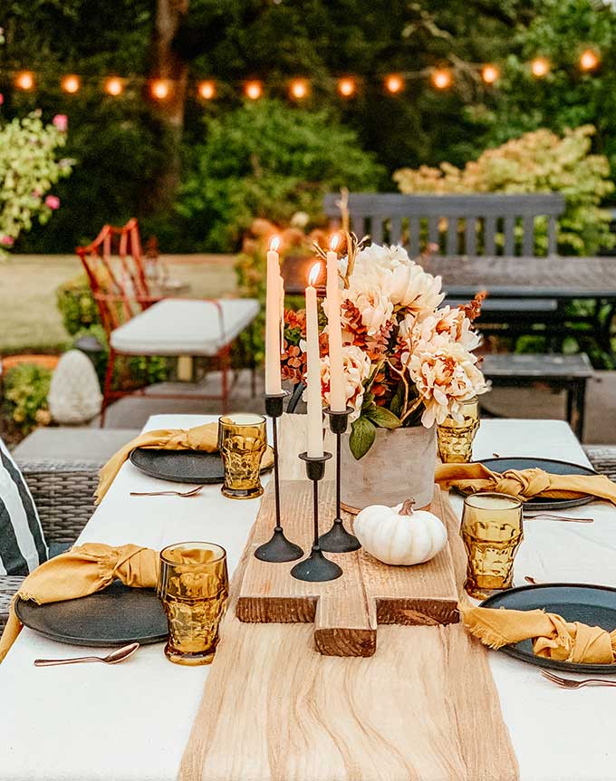 Easy Fall Outdoor Table with Drop Cloth |drop cloth tablecloth|diy tablecloth|fall outdoor table|farmhouse table|outdoor entertaining|farmhouse style|wedding table|wedding table setting|gauze table runner|cheesecloth table runner|simple fall decor|easy fall table|fall centerpiece|simple farmhouse table|pumpkin table setting|fall pumpkin table|cozy table setting|cozy fall|hygge home|Hallstrom Home