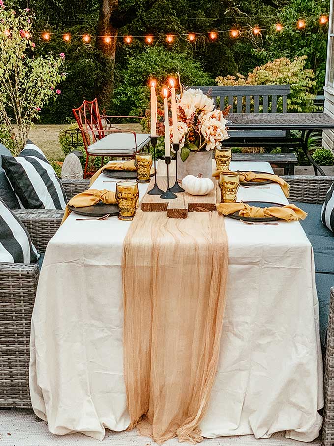 Easy Fall Outdoor Table with Drop Cloth |drop cloth tablecloth|diy tablecloth|fall outdoor table|farmhouse table|outdoor entertaining|farmhouse style|wedding table|wedding table setting|gauze table runner|cheesecloth table runner|simple fall decor|easy fall table|fall centerpiece|simple farmhouse table|pumpkin table setting|fall pumpkin table|cozy table setting|cozy fall|hygge home|Hallstrom Home