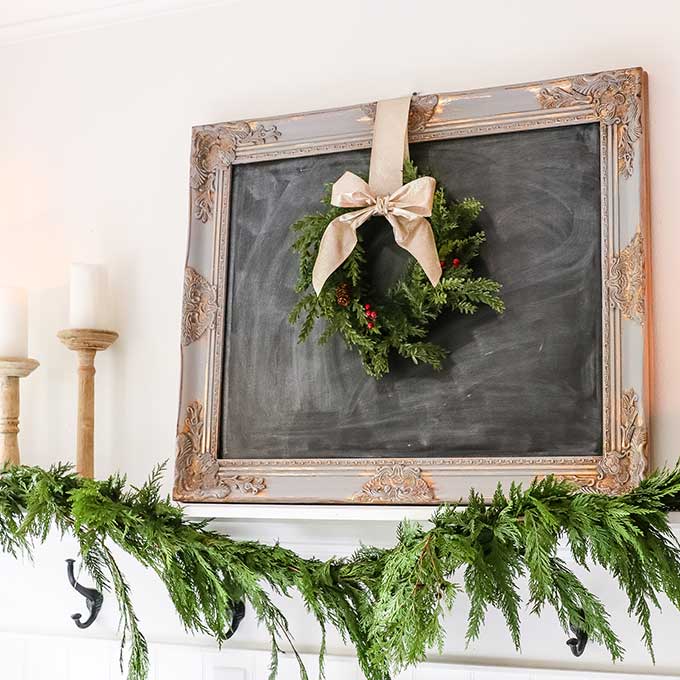 Farmhouse Entry with Fresh Holiday Garland |Christmas decor|farmhouse Christmas|farmhouse entryway|white farmhouse|christmas garland|decorate for christmas|shabby chic home|shabby chic decor|farmhouse style|christmas chalk board|christmas wreath|christmas garland|Hallstrom home