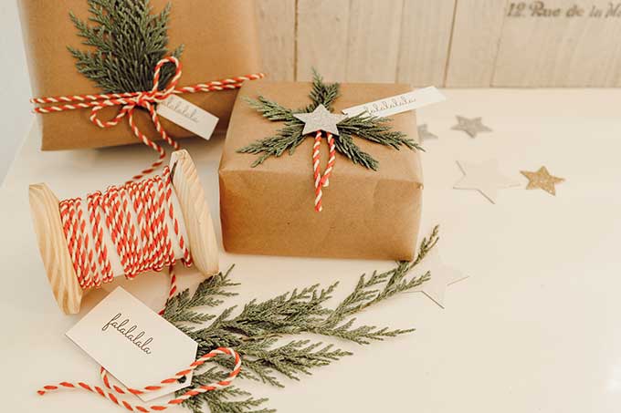 Natural Holiday Gift Wrap with Greenery |simple christmas wrapping|scandinavian Christmas|scandinavian christmas wrapping|christmas tree wrapping paper|best Christmas wrap ideas|cedar gift wrap|free printables|christmas gift tags|christmas printables|easy gift wrap ideas|farmhouse christmas|white farmhouse|easy gift diy|Hallstrom Home