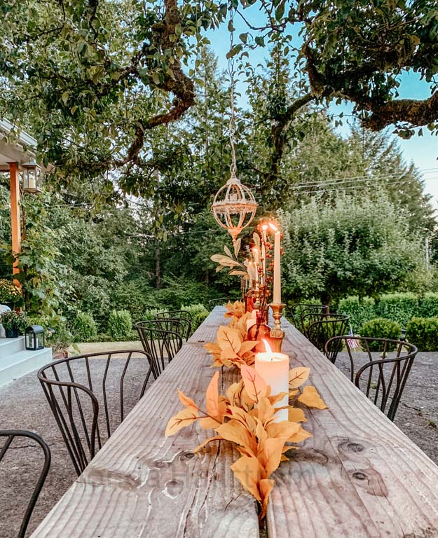 Outdoor Fall Tablescape with Leaves |fall table settings|farmhouse table|fall farmhouse table|farmhouse decor|fall leaves|fall leaf diy|outdoor tablescape|fall table settings|amber jars|fall centerpiece|amber fall decor|fall diy|fall craft|Hallstrom Home